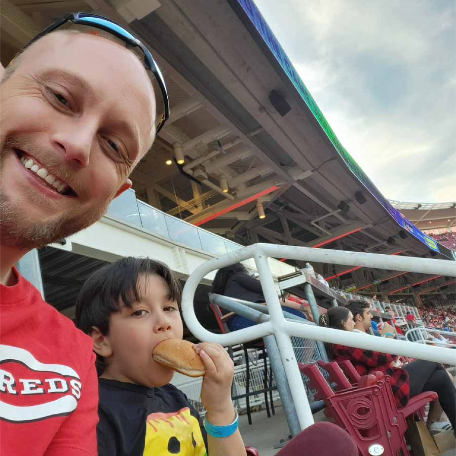 Josh and his nephew Solmon enjoy a Cincinnati Reds Game